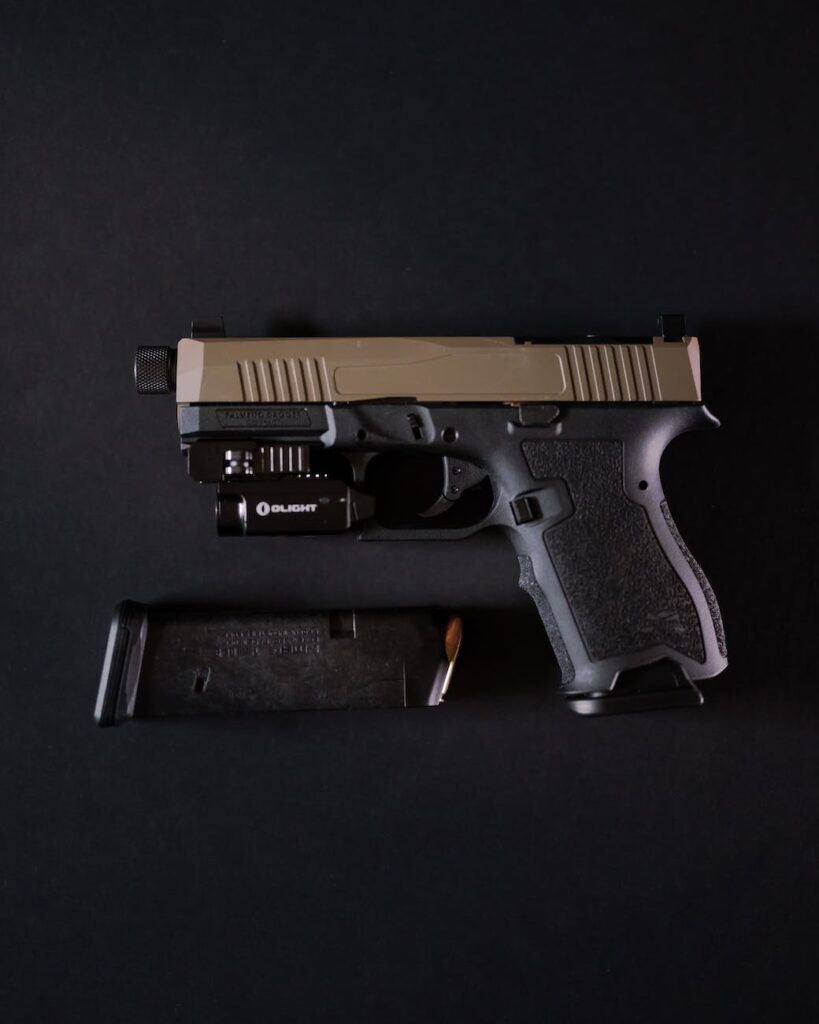 black and gray semi automatic pistol in close up shot